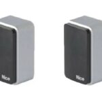 Coppia di fotocellule da esterno, orientabili 30°, per collegamento via Nice BlueBUS