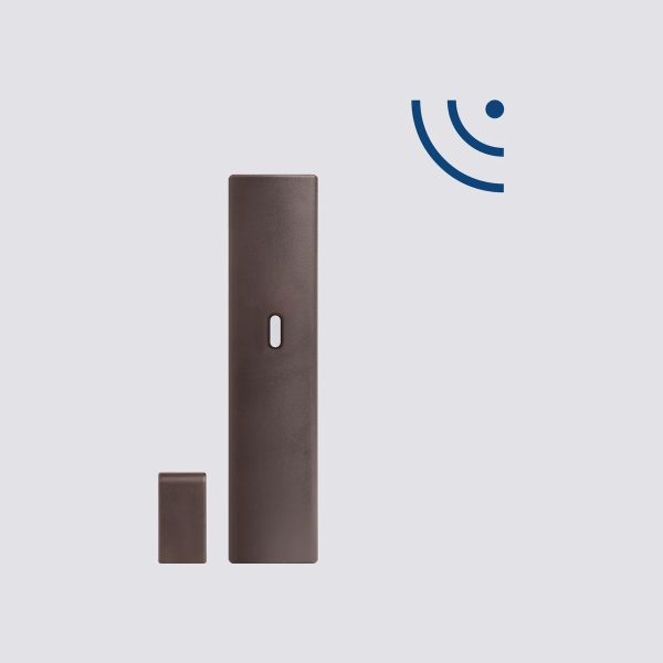 Contatto magnetico via radio bidirezionale in contenitore termoplastico marrone.